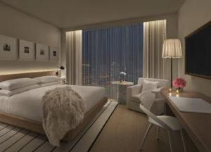Guest room with fur throw on bed